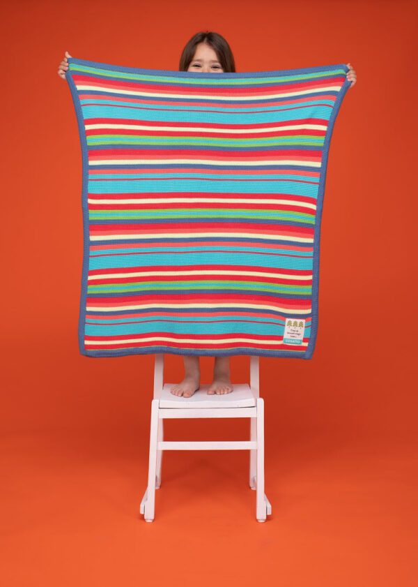 Cosatto Blanket - Multi-Coloured - Product Showcase with Child