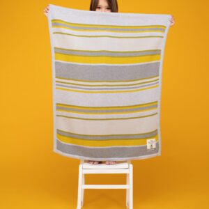 Cosatto Blanket - Grey Yellow Product Showcase with Child